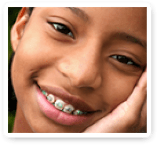 Child with braces smiling